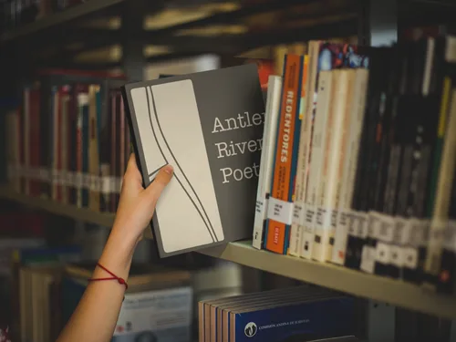 book-mockup-being-picked-up-at-a-library-a19276.png