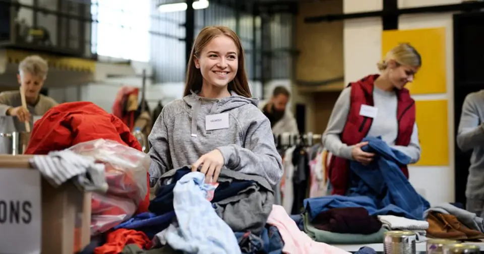 Not-for-profit workers and volunteers sorting donations