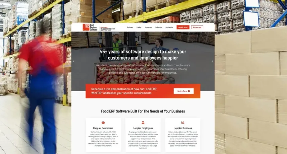 A warehouse worker in blue clothing walks past tall shelves stocked with boxes. Overlaid is a food distribution software website for FDS, showcasing ERP software benefits for customers, employees, and businesses.