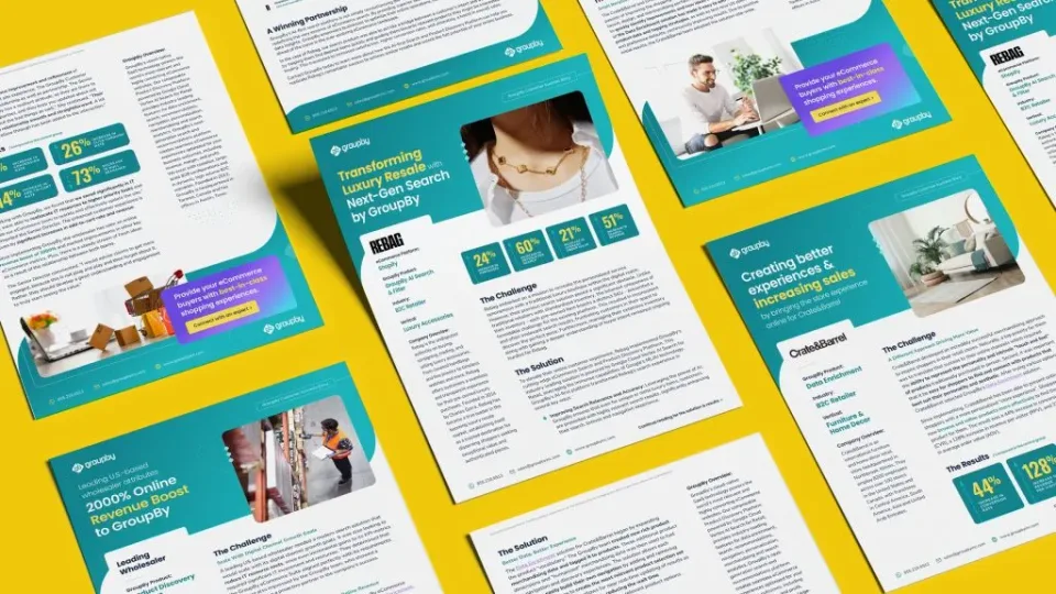 Digital marketing case study documents are arranged on a bright yellow surface, showcasing enterprise SaaS marketing successes with statistics, images of people working, product photos, and vibrant graphics. The papers are visually engaging and professionally designed.