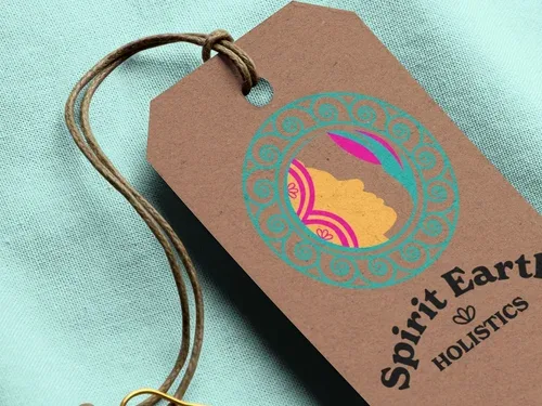 minimal-mockup-featuring-a-cardboard-brand-tag-lying-on-a-solid-color-fabric-27636.jpg